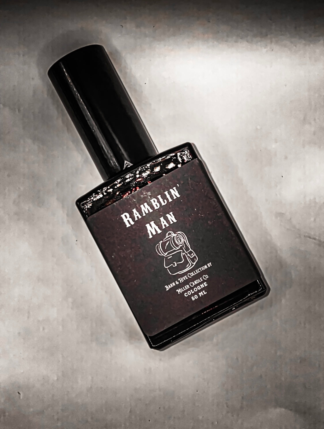 Black bottle of 'Ramblin Man' on a metallic surface