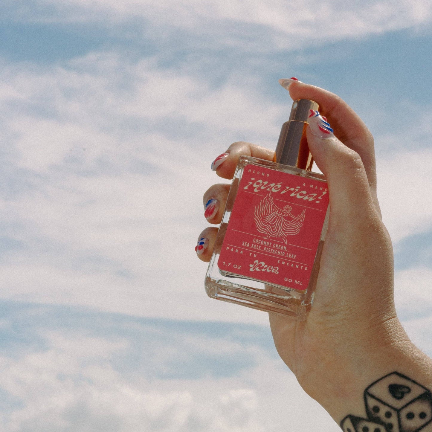 RICA Que Rica bottle spray sky