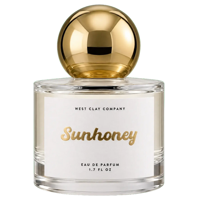 Perfume bottle labeled 'Sunhoney' by West Clay Company on a white background