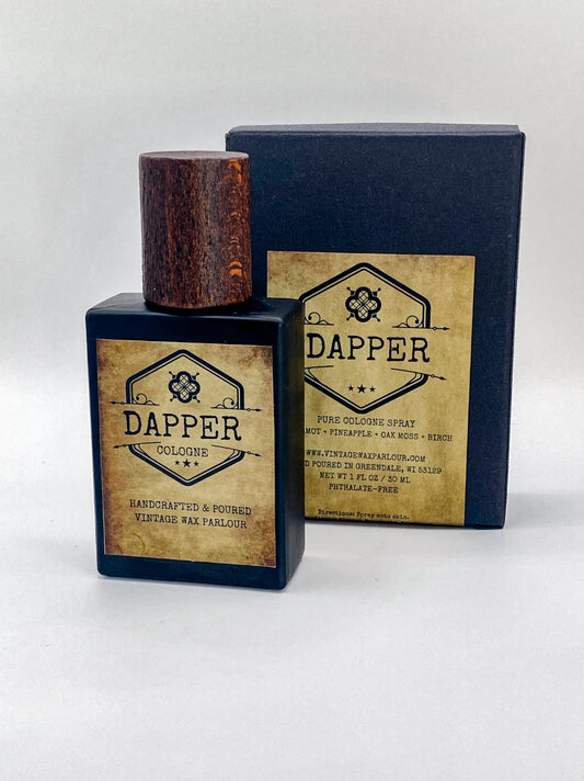Dapper cologne bottle and packaging on a white background