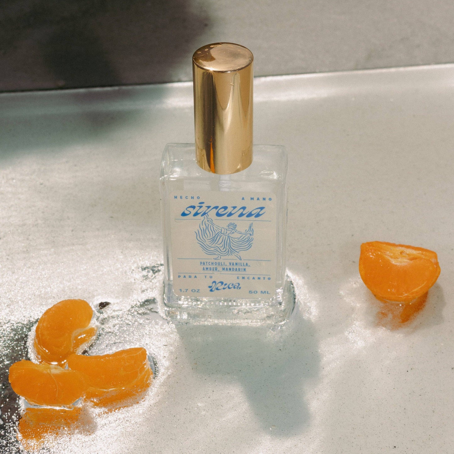 Sirena by RICA bottle with orange slices